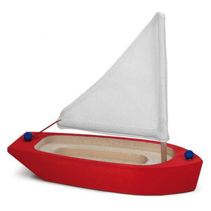Red hull sailing boat